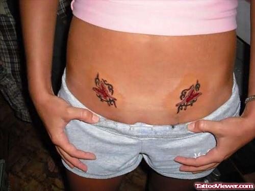 Younger Girls Tattoos on the Stomach