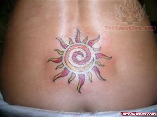 Lower Back Tribal Sun Tattoo