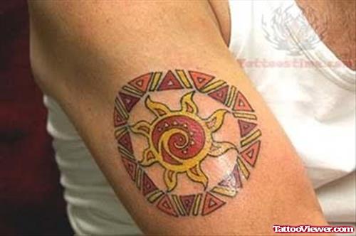 Tribal Sun Tattoo on Bicep