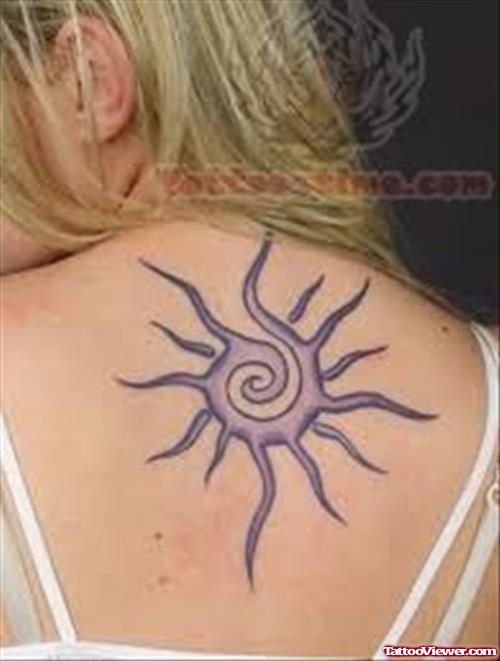 Purple Ink Sun Tattoo On Girl Back