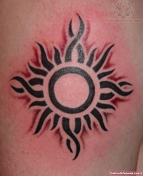 Tribal Sun Tattoo On Sleeve