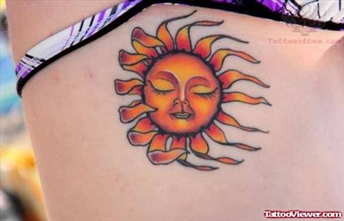 Sun Tattoo On Rib