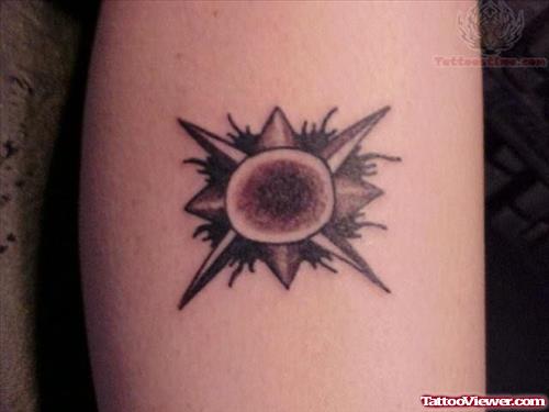 Small Black Sun Tattoo