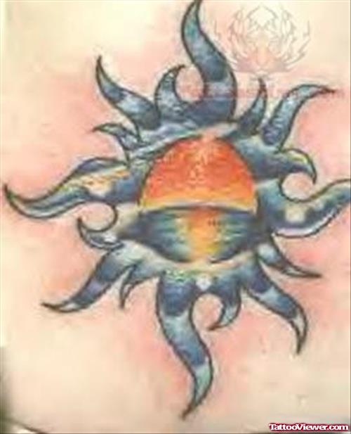 Blue Sun Tattoo On Waist