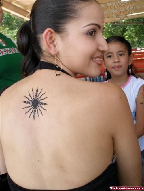 Small Sun Tattoo On Back For Girls