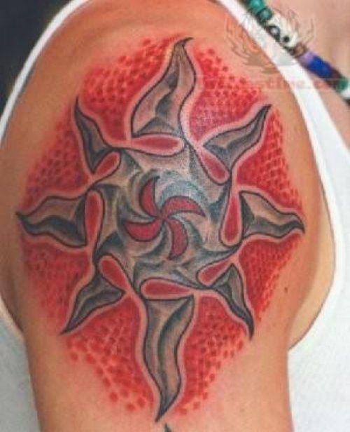 Tribal Red ink Sun Tattoo On Bicep