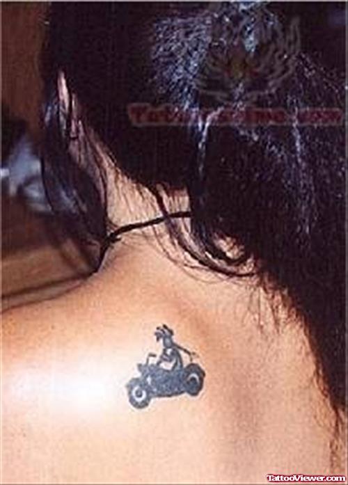 Girl Showing Bike Symbol Tattoo On Her Back