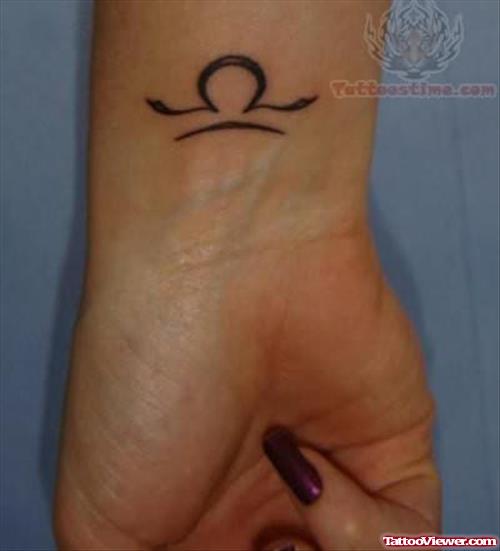 Libra Tattoo Sign on Wrist