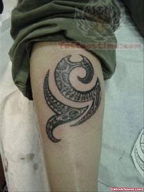 Black Symbol Tattoo On Arm