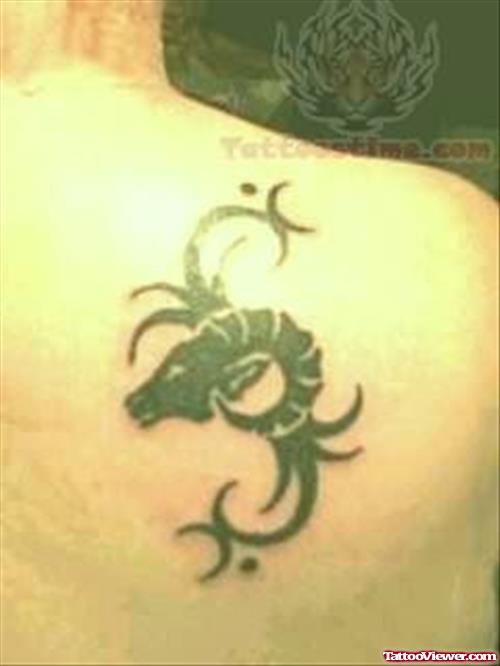 Black Worm Symbol Tattoo