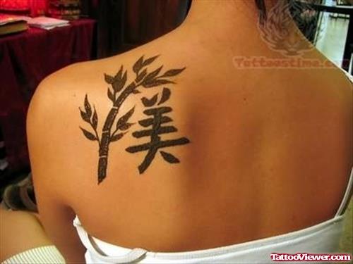 Chinese Symbol Tattoo on Girl Shoulder