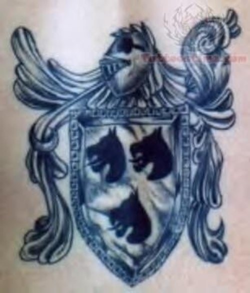 Blueish Symbol Tattoo
