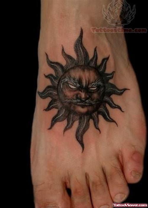 Black Ink Taino Sun Tattoo On Foot
