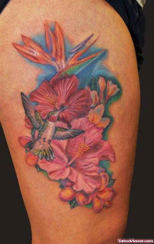 flying Hummingbird And Hibiscus Flowers Tattoo On Thigh