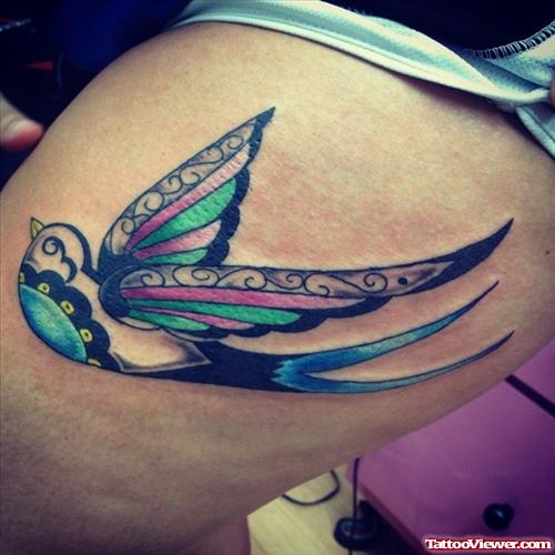 Colored Flying Bird Thigh Tattoo