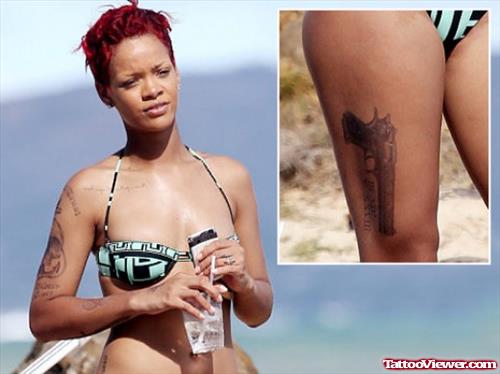 Celebrity Gun Thigh Tattoo