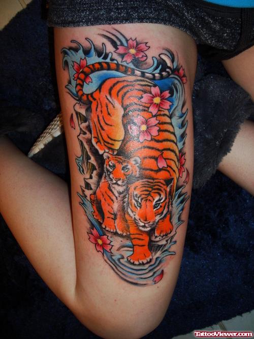 Japanese Flowers And Tiger Thigh Tattoo