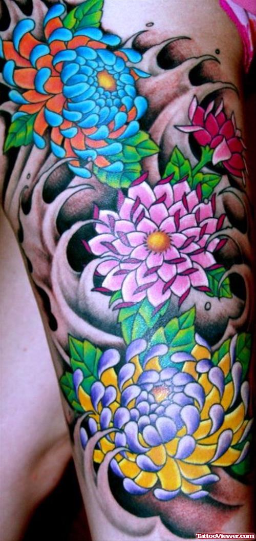 Colored Japanese Flowers Thigh Tattoo