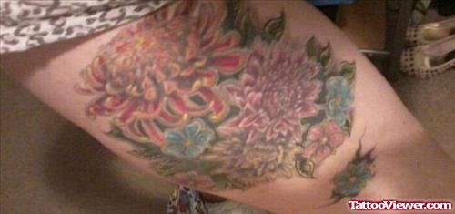 Beautiful Colored Flowers Thigh Tattoo