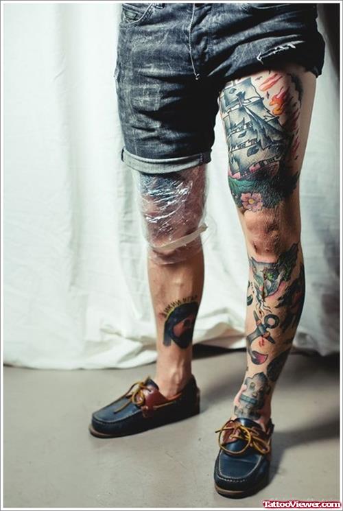 Colored Ink Left Thigh Tattoos