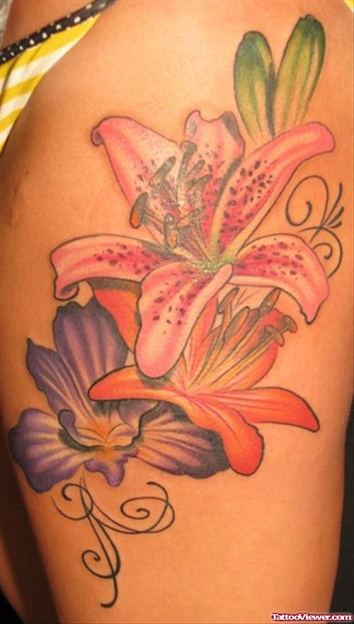 Colored Flowers Thigh Tattoo