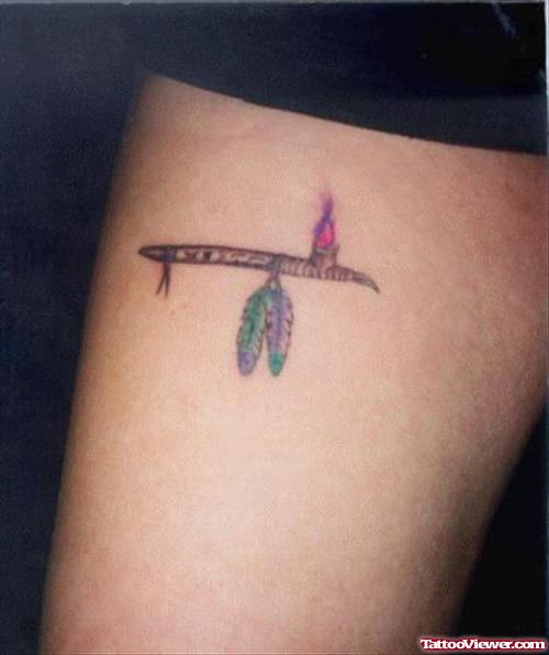 Cute Small Colored Feathers Thigh Tattoo