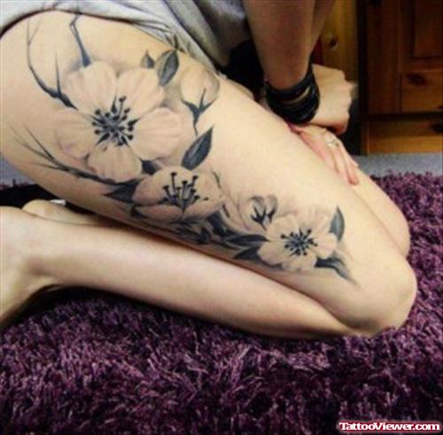 Awesome Grey Flowers Thigh Tattoo