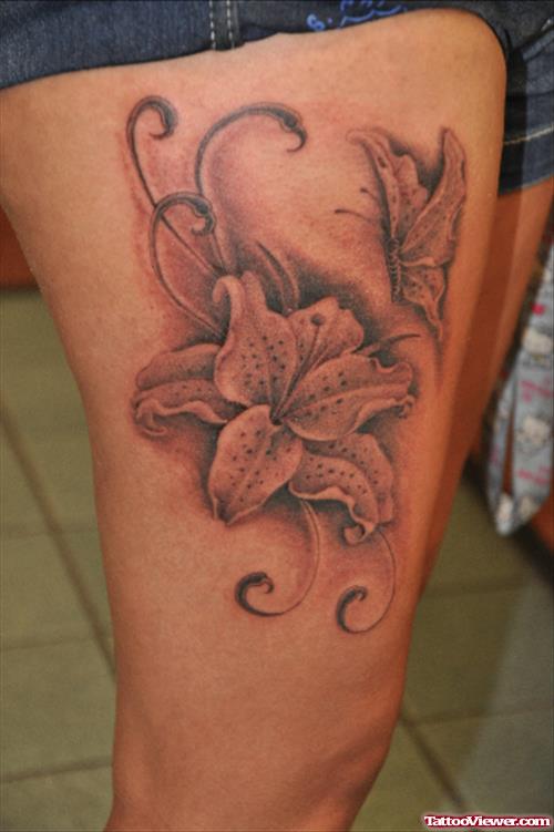 Hibiscus Flower And Butterfly Thigh Tattoo