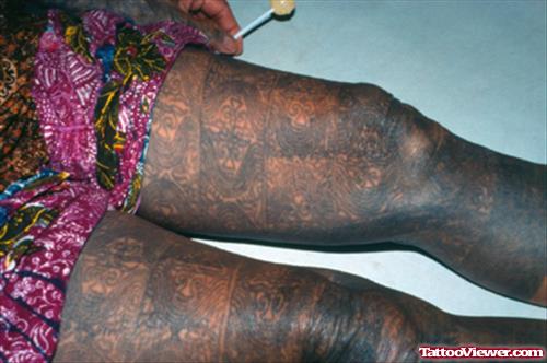 Black Ink Thigh Tattoos