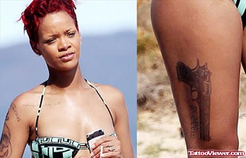Rihanna With Gun Tattoo On Thigh
