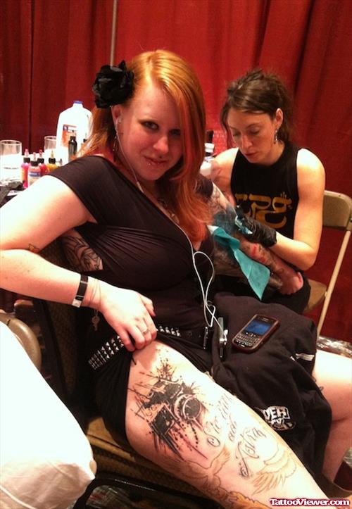 Girl Showing Her Thigh Tattoo Of Flying Birds And Abstract