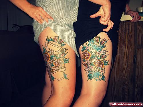 Cups And Rose Flowers With Banners Thigh Tattoo