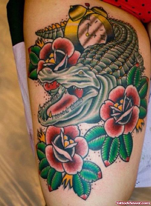 Red Flowers And Alligator Thigh Tattoo