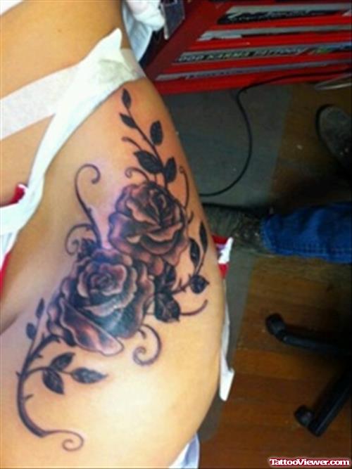Grey Roses Tattoo On Thigh And Hip