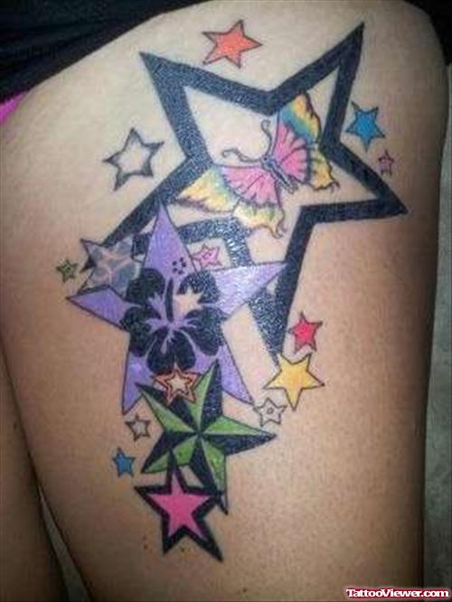 Colored Stars Thigh Tattoo