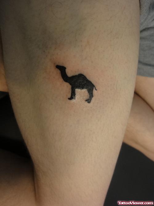 Small Black Camel Thigh Tattoo