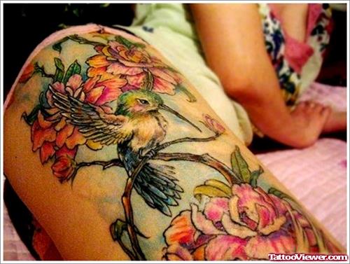 Flying Bird and Flowers Thigh Tattoo