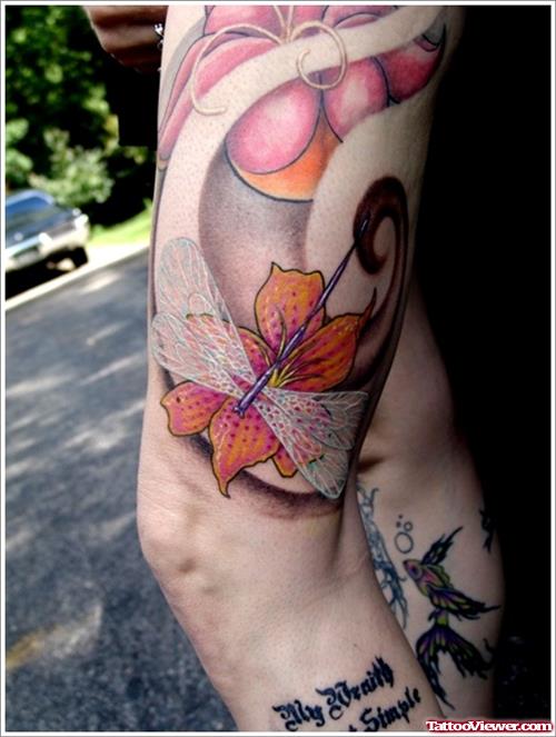 Dragonfly And Flower Tattoo On Left Thigh