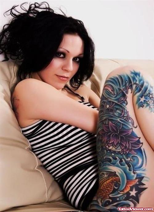 Lotus And Fish Colored Thigh Tattoo