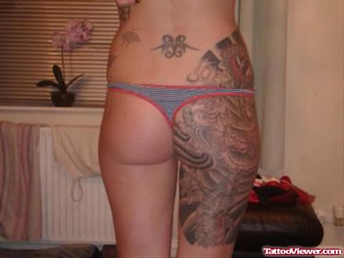 Grey Ink Back Thigh Tattoo