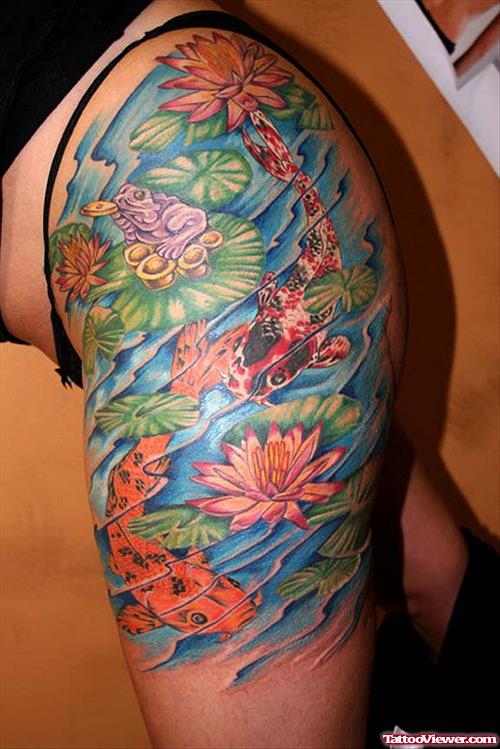 Colored Koi Fish And Colored Flowers Tattoos On Girl Left Side Thigh