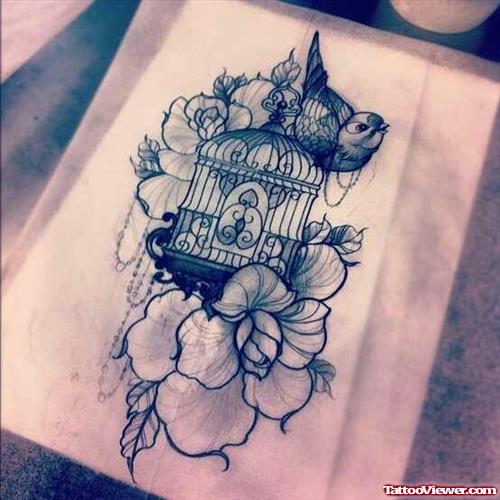 Cage And Flowers With Bird Thigh Tattoo Design