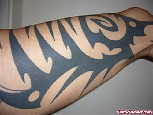 Tribal Tattoo On Thigh