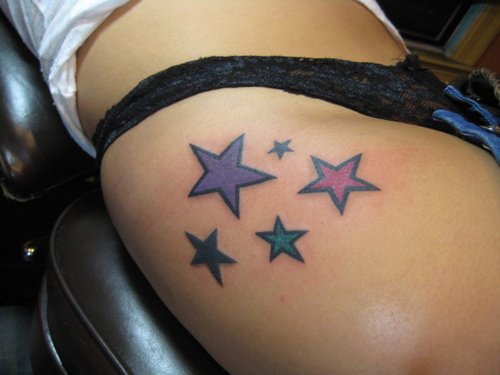 Colored Stars Tattoos On Girl Side Thigh