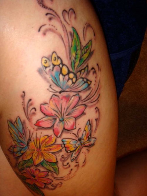 Colored Flowers And Butterfly Thigh Tattoo