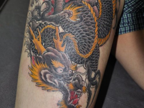 Amazing Thigh Dragon Tattoo