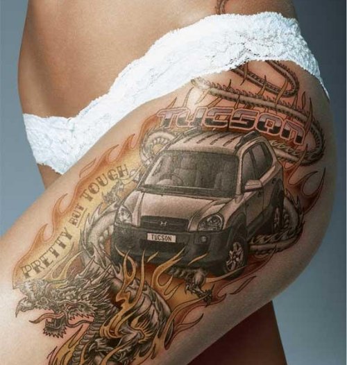 Dragon And Car Thigh Tattoo