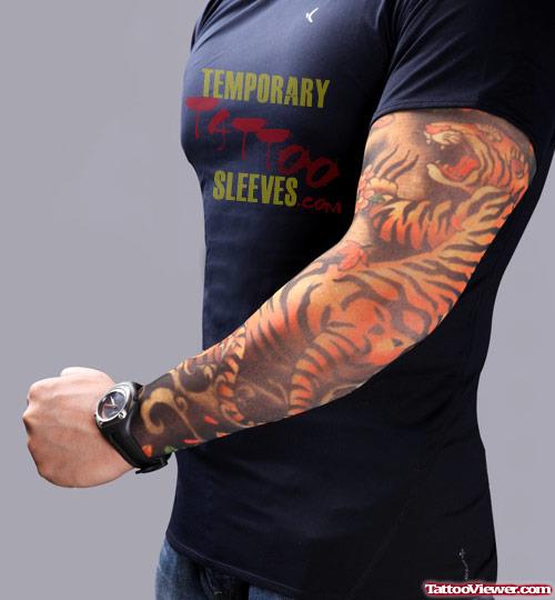 Awesome colored Tiger Tattoo On Man Left Sleeve