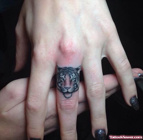 Small Tiger Face Tattoo On Finger