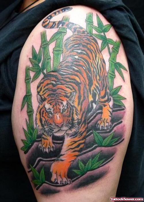 Awful Colored Tiger Tattoo On Left Half Sleeve